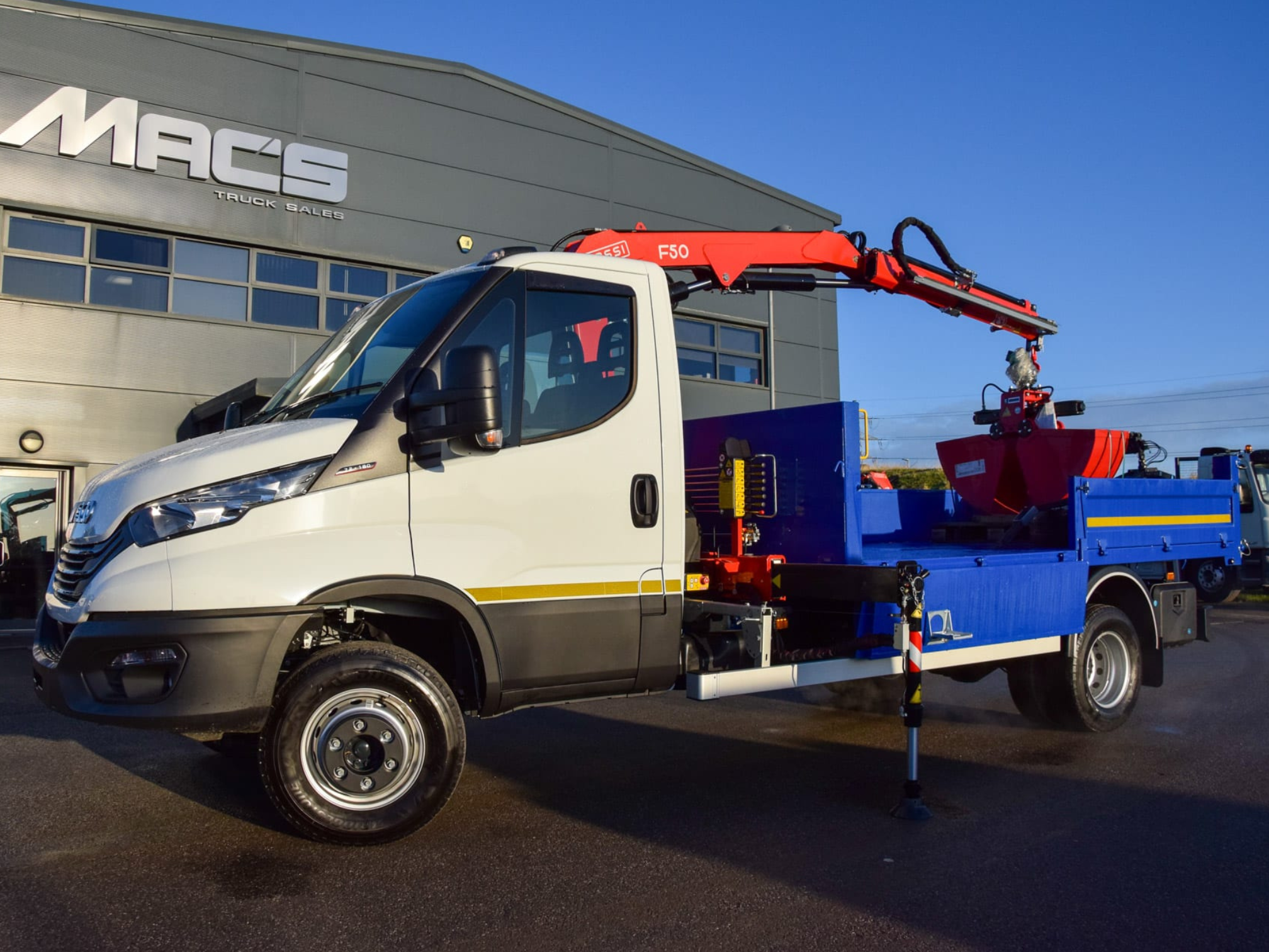 A 7.5 tonne tipper grab truck ready to rent and hire